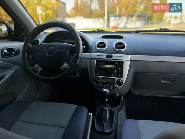 Черный Шевроле Лачетти, объемом двигателя 1.8 л и пробегом 252 тыс. км за 5199 $, фото 5 на Automoto.ua