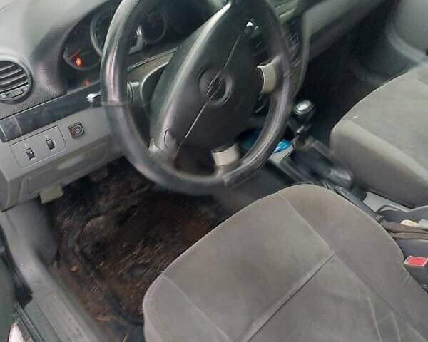 Черный Шевроле Лачетти, объемом двигателя 1.6 л и пробегом 200 тыс. км за 2999 $, фото 3 на Automoto.ua