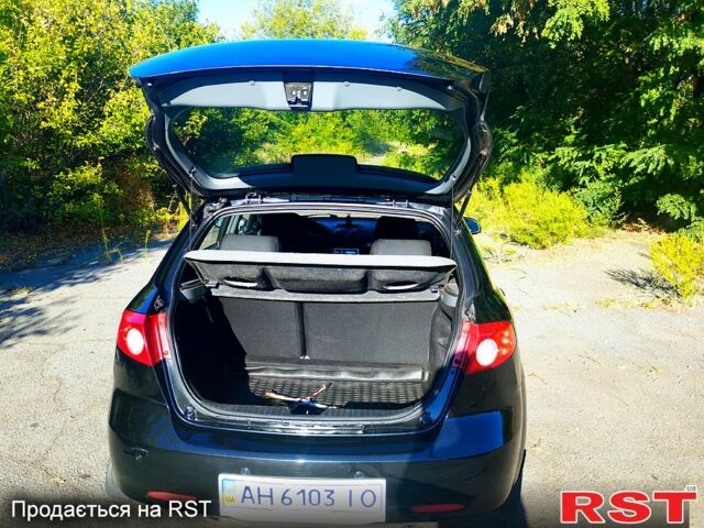 Черный Шевроле Лачетти, объемом двигателя 1.8 л и пробегом 233 тыс. км за 3200 $, фото 2 на Automoto.ua