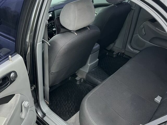 Черный Шевроле Лачетти, объемом двигателя 1.6 л и пробегом 320 тыс. км за 4000 $, фото 7 на Automoto.ua