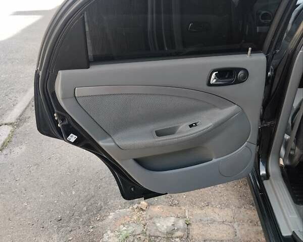 Черный Шевроле Лачетти, объемом двигателя 1.8 л и пробегом 268 тыс. км за 4400 $, фото 10 на Automoto.ua