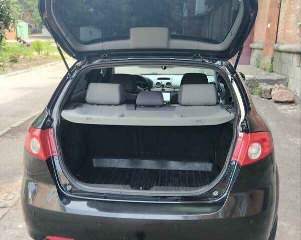 Черный Шевроле Лачетти, объемом двигателя 1.8 л и пробегом 268 тыс. км за 4400 $, фото 12 на Automoto.ua