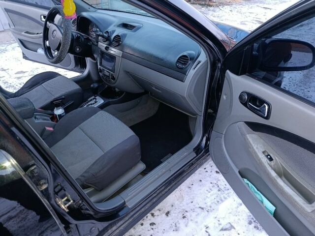 Черный Шевроле Лачетти, объемом двигателя 1.8 л и пробегом 230 тыс. км за 3900 $, фото 7 на Automoto.ua