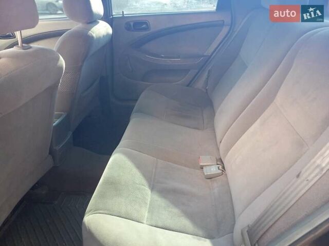 Черный Шевроле Лачетти, объемом двигателя 1.6 л и пробегом 284 тыс. км за 3700 $, фото 5 на Automoto.ua