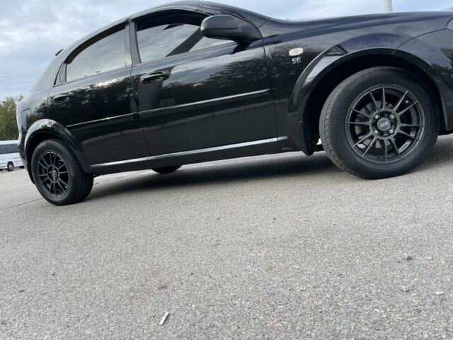 Черный Шевроле Лачетти, объемом двигателя 1.6 л и пробегом 144 тыс. км за 5100 $, фото 10 на Automoto.ua