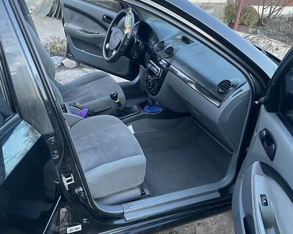 Чорний Шевроле Лачетті, об'ємом двигуна 1.6 л та пробігом 219 тис. км за 3300 $, фото 11 на Automoto.ua