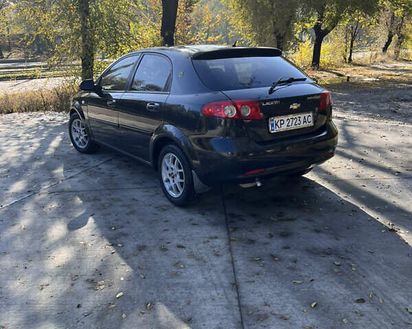 Черный Шевроле Лачетти, объемом двигателя 1.6 л и пробегом 334 тыс. км за 3899 $, фото 5 на Automoto.ua
