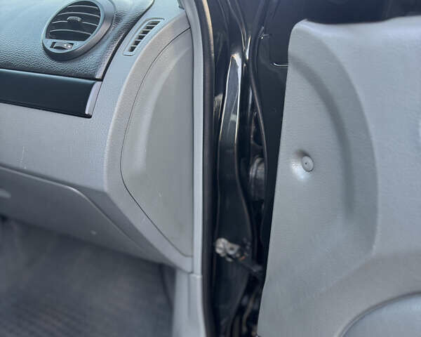 Черный Шевроле Лачетти, объемом двигателя 1.6 л и пробегом 209 тыс. км за 3850 $, фото 17 на Automoto.ua