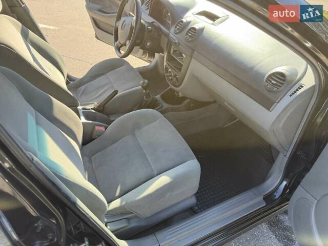 Черный Шевроле Лачетти, объемом двигателя 1.6 л и пробегом 140 тыс. км за 4300 $, фото 10 на Automoto.ua