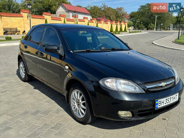 Черный Шевроле Лачетти, объемом двигателя 1.8 л и пробегом 160 тыс. км за 5000 $, фото 5 на Automoto.ua