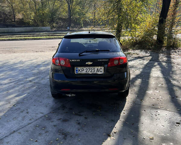 Черный Шевроле Лачетти, объемом двигателя 1.6 л и пробегом 334 тыс. км за 3899 $, фото 4 на Automoto.ua
