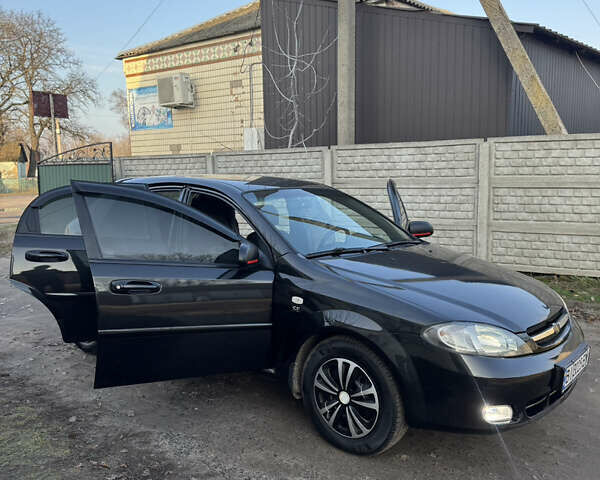 Черный Шевроле Лачетти, объемом двигателя 1.6 л и пробегом 209 тыс. км за 3850 $, фото 35 на Automoto.ua