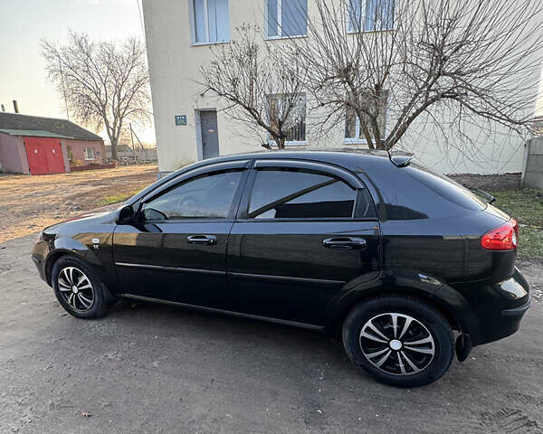 Черный Шевроле Лачетти, объемом двигателя 1.6 л и пробегом 209 тыс. км за 3850 $, фото 4 на Automoto.ua