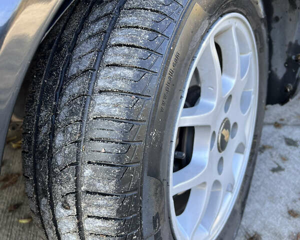 Черный Шевроле Лачетти, объемом двигателя 1.6 л и пробегом 334 тыс. км за 3899 $, фото 13 на Automoto.ua