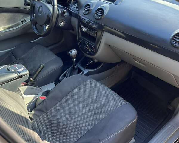 Черный Шевроле Лачетти, объемом двигателя 1.6 л и пробегом 334 тыс. км за 3899 $, фото 9 на Automoto.ua