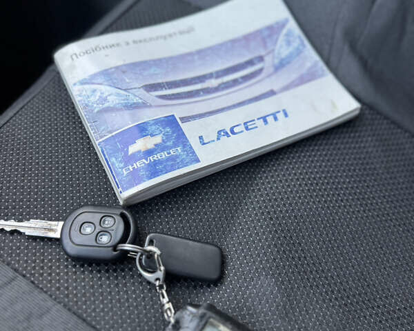 Черный Шевроле Лачетти, объемом двигателя 1.6 л и пробегом 209 тыс. км за 3850 $, фото 38 на Automoto.ua