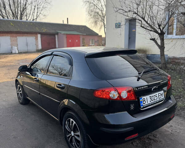Черный Шевроле Лачетти, объемом двигателя 1.6 л и пробегом 209 тыс. км за 3850 $, фото 7 на Automoto.ua