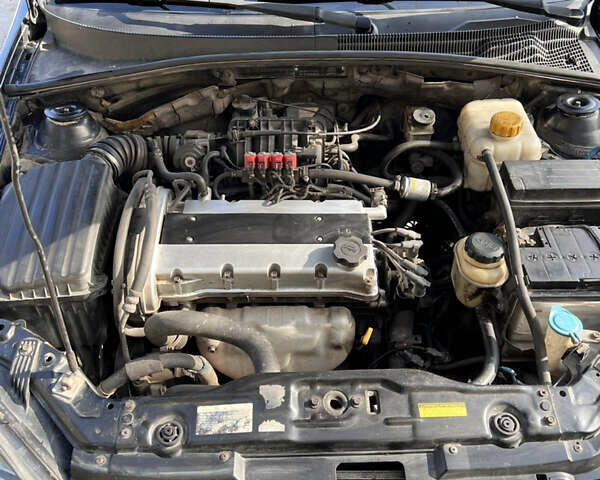 Черный Шевроле Лачетти, объемом двигателя 1.6 л и пробегом 334 тыс. км за 3899 $, фото 12 на Automoto.ua