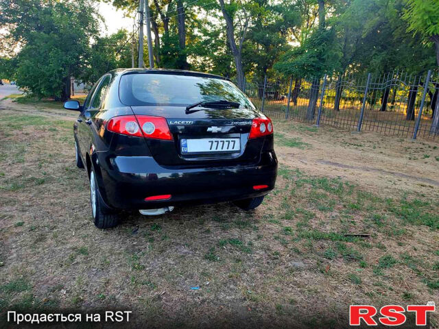 Черный Шевроле Лачетти, объемом двигателя 1.6 л и пробегом 189 тыс. км за 4500 $, фото 12 на Automoto.ua