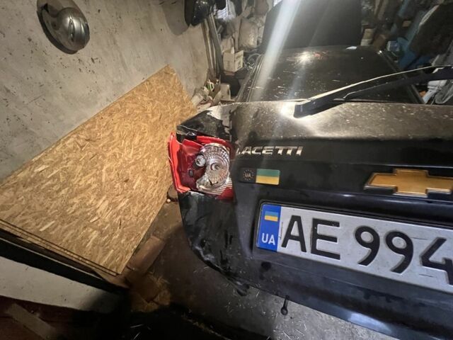 Черный Шевроле Лачетти, объемом двигателя 1.6 л и пробегом 280 тыс. км за 1537 $, фото 2 на Automoto.ua