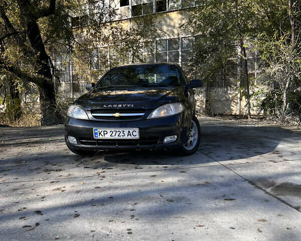 Черный Шевроле Лачетти, объемом двигателя 1.6 л и пробегом 334 тыс. км за 3899 $, фото 2 на Automoto.ua
