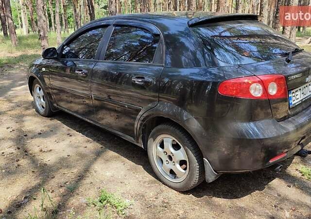 Черный Шевроле Лачетти, объемом двигателя 1.6 л и пробегом 203 тыс. км за 4000 $, фото 2 на Automoto.ua