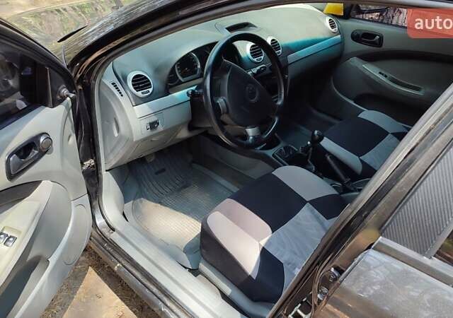 Черный Шевроле Лачетти, объемом двигателя 1.6 л и пробегом 203 тыс. км за 4000 $, фото 6 на Automoto.ua