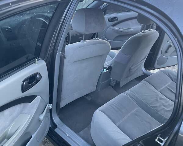 Чорний Шевроле Лачетті, об'ємом двигуна 1.6 л та пробігом 219 тис. км за 3300 $, фото 13 на Automoto.ua