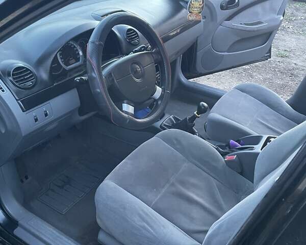 Чорний Шевроле Лачетті, об'ємом двигуна 1.6 л та пробігом 219 тис. км за 3300 $, фото 7 на Automoto.ua