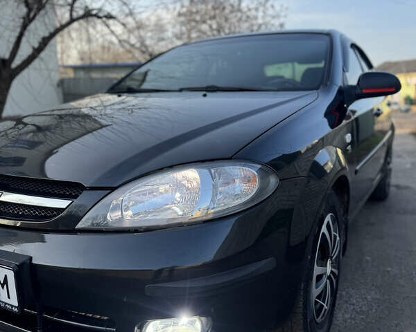 Черный Шевроле Лачетти, объемом двигателя 1.6 л и пробегом 209 тыс. км за 3850 $, фото 9 на Automoto.ua