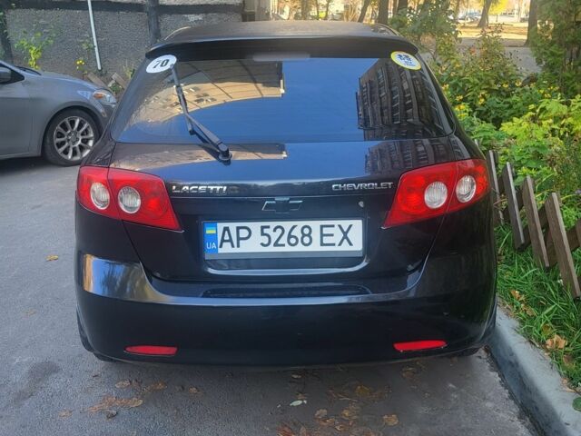 Черный Шевроле Лачетти, объемом двигателя 1.8 л и пробегом 249 тыс. км за 4200 $, фото 2 на Automoto.ua