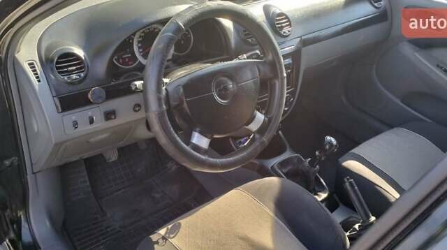 Чорний Шевроле Лачетті, об'ємом двигуна 1.6 л та пробігом 241 тис. км за 3900 $, фото 9 на Automoto.ua