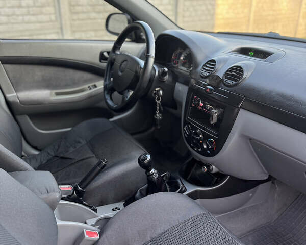 Черный Шевроле Лачетти, объемом двигателя 1.6 л и пробегом 209 тыс. км за 3850 $, фото 14 на Automoto.ua