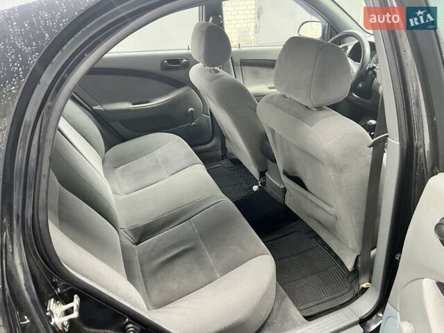 Черный Шевроле Лачетти, объемом двигателя 1.6 л и пробегом 110 тыс. км за 4600 $, фото 45 на Automoto.ua