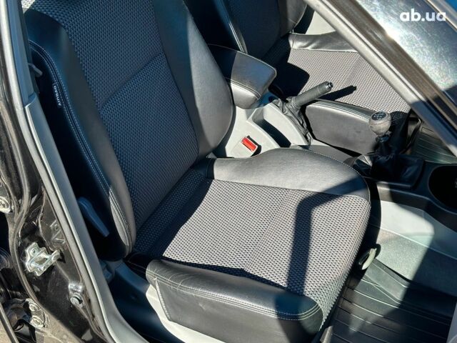 Черный Шевроле Лачетти, объемом двигателя 1.8 л и пробегом 146 тыс. км за 4990 $, фото 33 на Automoto.ua