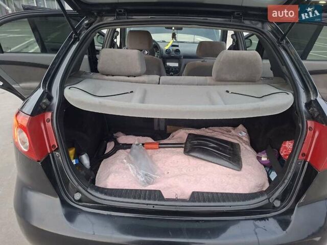 Черный Шевроле Лачетти, объемом двигателя 1.6 л и пробегом 217 тыс. км за 4000 $, фото 7 на Automoto.ua