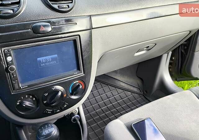 Черный Шевроле Лачетти, объемом двигателя 1.6 л и пробегом 251 тыс. км за 3500 $, фото 9 на Automoto.ua