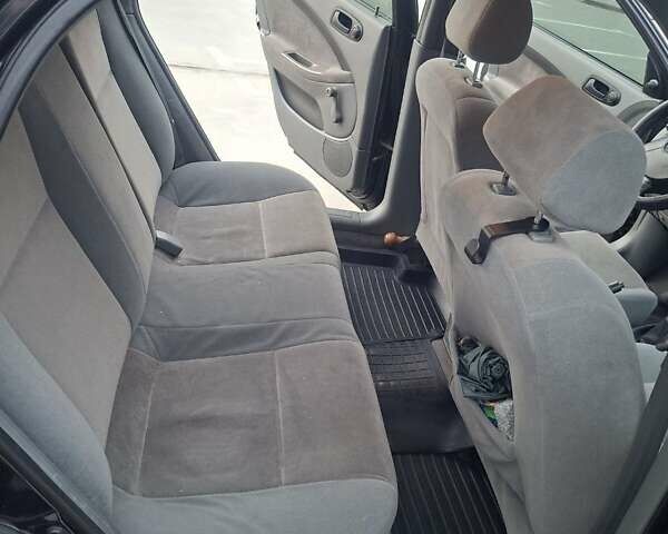 Черный Шевроле Лачетти, объемом двигателя 1.6 л и пробегом 217 тыс. км за 4000 $, фото 9 на Automoto.ua