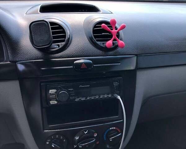 Черный Шевроле Лачетти, объемом двигателя 1.6 л и пробегом 334 тыс. км за 4200 $, фото 12 на Automoto.ua