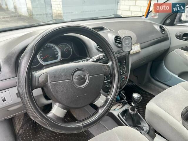 Черный Шевроле Лачетти, объемом двигателя 1.6 л и пробегом 110 тыс. км за 4600 $, фото 40 на Automoto.ua