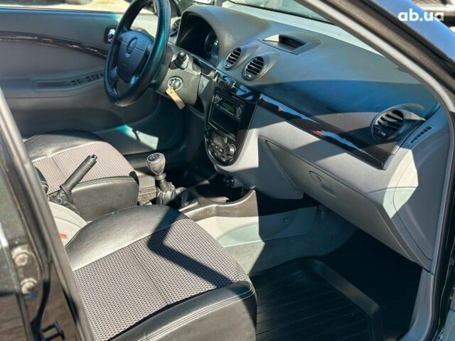 Черный Шевроле Лачетти, объемом двигателя 1.8 л и пробегом 146 тыс. км за 4990 $, фото 32 на Automoto.ua