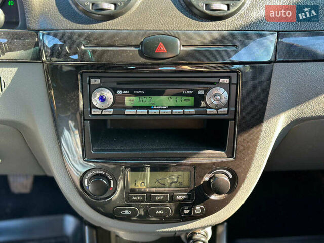 Черный Шевроле Лачетти, объемом двигателя 1.8 л и пробегом 146 тыс. км за 4990 $, фото 29 на Automoto.ua