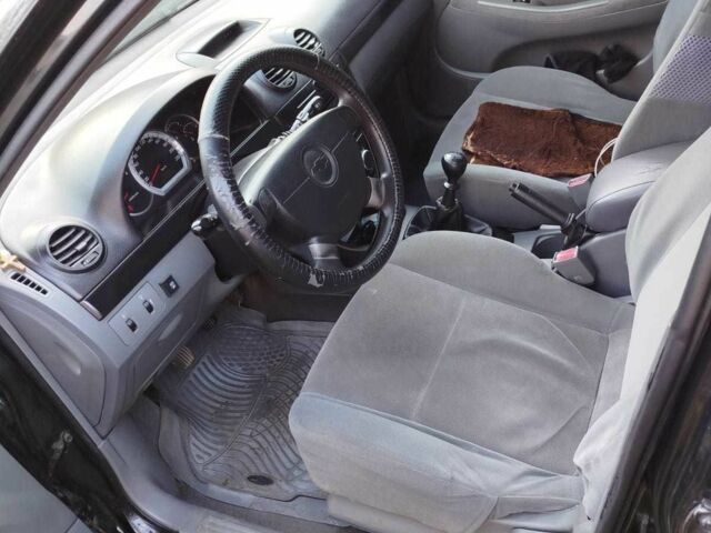 Черный Шевроле Лачетти, объемом двигателя 1.6 л и пробегом 177 тыс. км за 2500 $, фото 8 на Automoto.ua