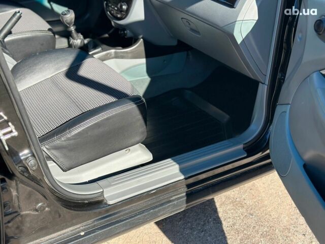 Черный Шевроле Лачетти, объемом двигателя 1.8 л и пробегом 146 тыс. км за 4990 $, фото 34 на Automoto.ua