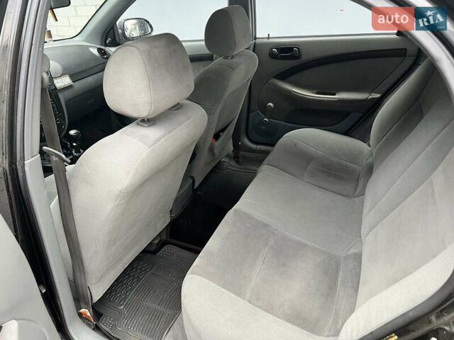 Черный Шевроле Лачетти, объемом двигателя 1.6 л и пробегом 110 тыс. км за 4600 $, фото 50 на Automoto.ua