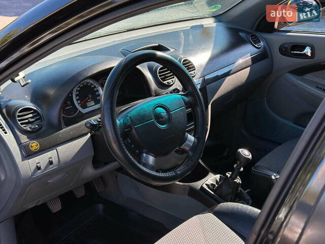 Черный Шевроле Лачетти, объемом двигателя 1.8 л и пробегом 146 тыс. км за 4990 $, фото 25 на Automoto.ua