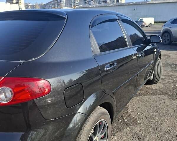 Черный Шевроле Лачетти, объемом двигателя 1.8 л и пробегом 136 тыс. км за 4800 $, фото 4 на Automoto.ua