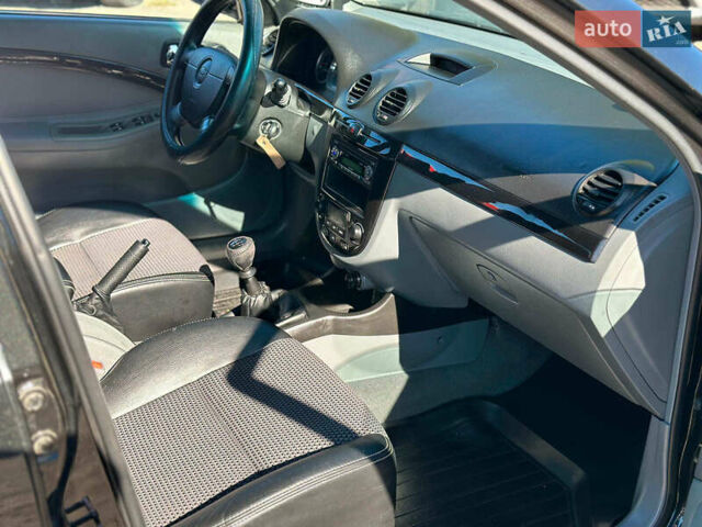 Черный Шевроле Лачетти, объемом двигателя 1.8 л и пробегом 146 тыс. км за 4990 $, фото 33 на Automoto.ua