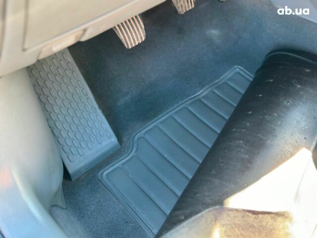 Черный Шевроле Лачетти, объемом двигателя 1.8 л и пробегом 146 тыс. км за 4990 $, фото 24 на Automoto.ua