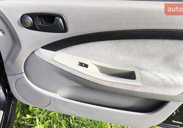 Черный Шевроле Лачетти, объемом двигателя 1.6 л и пробегом 251 тыс. км за 3500 $, фото 14 на Automoto.ua